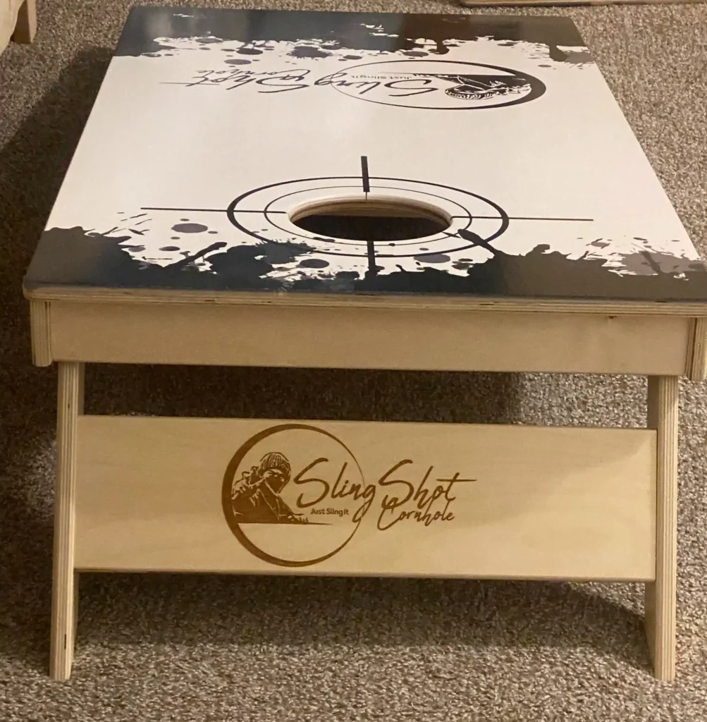 Our Slingshot Cornhole Board with old Logo